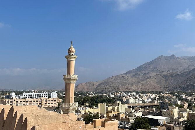 AMOUAGE: Full Day Private Tour to Nizwa and Jebel Akhdar - Nizwa Souq: dates, silver, and everyday trade