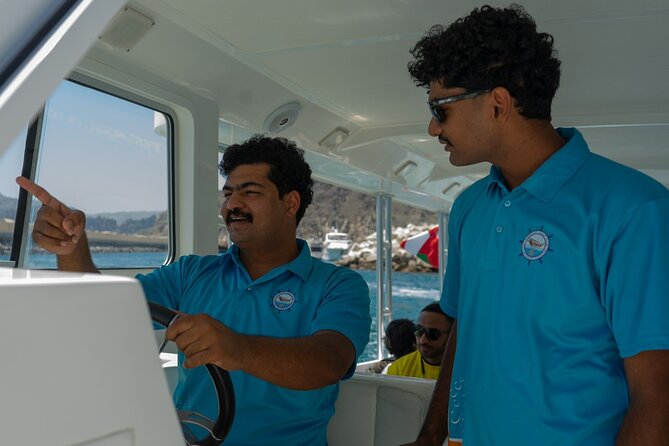 Dolphin Watching and Snorkeling Cruise Experience in Muscat - Waiting for dolphins in open water
