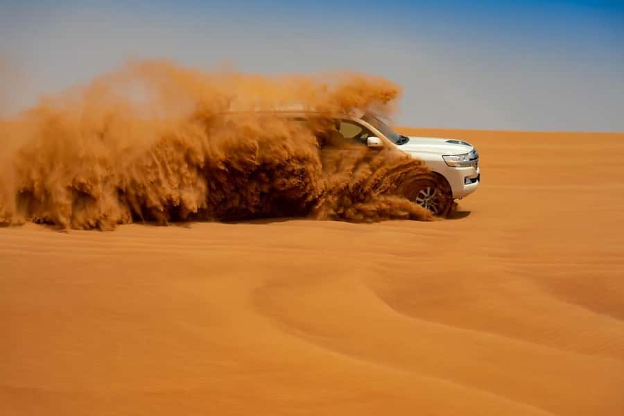 Dubai: Desert Safari with BBQ Dinner - Hotel pickup and the long road out