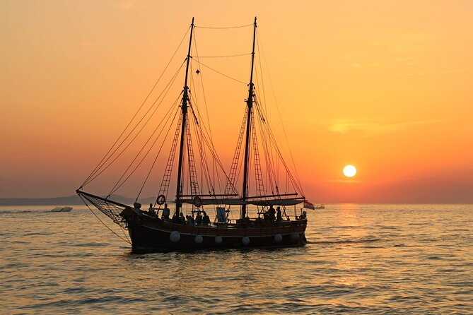 Evening Sunset Dhow Cruise Tour - Muscat - Following the Corniche toward the port