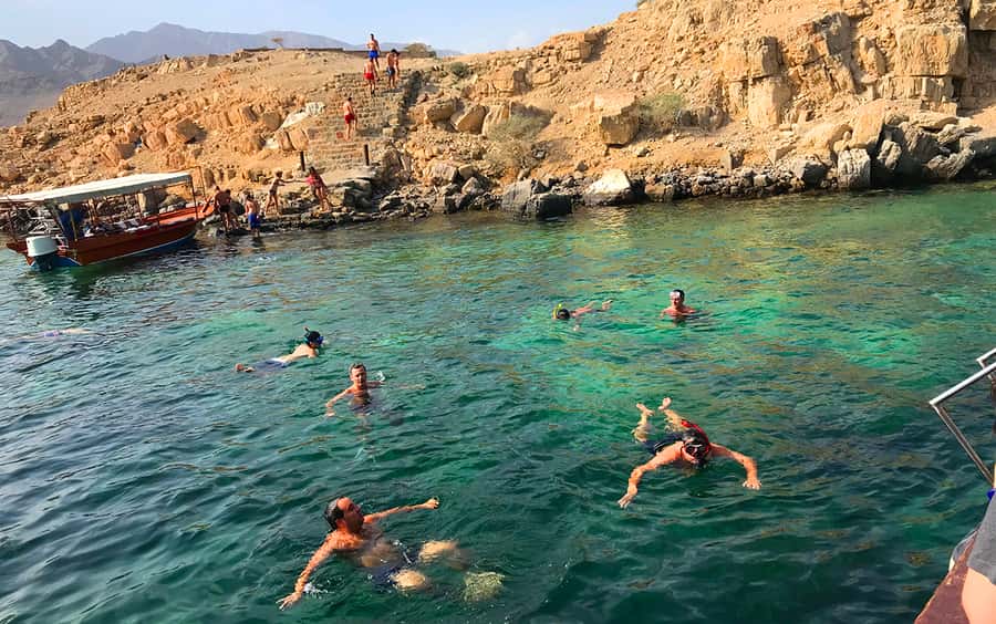 From Dubai: Musandam Khasab Tour with Boat Trip and Safari - Sayah village, fossils, and the human side of Musandam