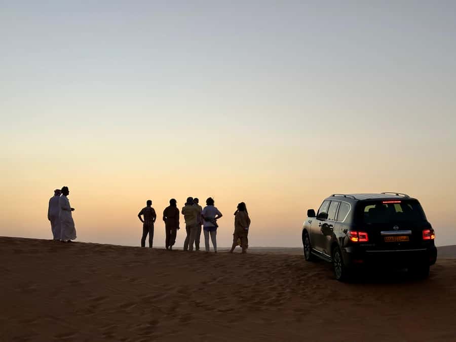 From Muscat: Desert Overnight and Wadi Bani Khalid - Sunset on the dunes and dinner after dark