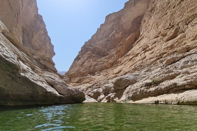 Full-Day Bimmah Sinkhole and Wadi Al Arbeieen Tour - A white-sand pause at Fins Beach