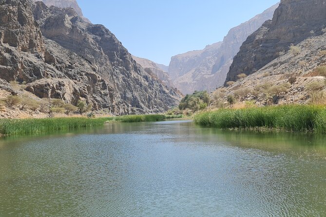 Full-Day Bimmah Sinkhole and Wadi Al Arbeieen Tour - Bimmah Sinkhole and its blue-green pool