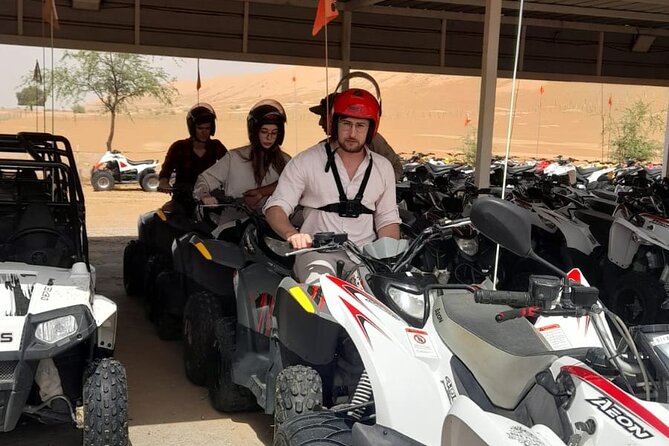 Full-Day Private Experience through Desert Adventure in Oman - Quad biking across the orange dunes