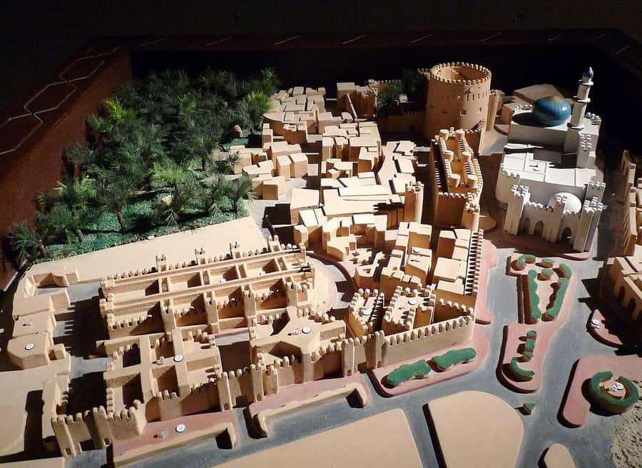 Full-Day Tour in Oman: Enchanting Forts of Nizwa and Jabreen - Bahla Fort, old walls, and a pottery workshop