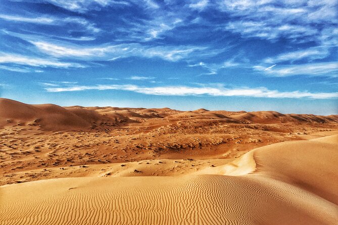 Full-Day Wahiba Desert and Wadi Bani Khalid Group Tour - Wadi Bani Khalid: pools, palms, and mountain villages