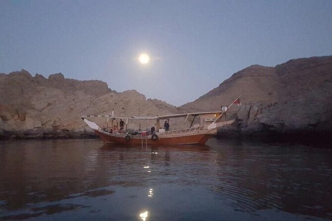 Khasab Dhow Cruise To Musandam Fjords With Lunch Onboard - Settling into a carpeted Omani boat