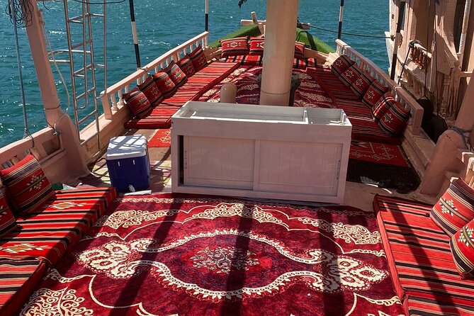 Khasab Dhow Cruise To Musandam Fjords With Lunch Onboard - Watching dolphins near the dhow