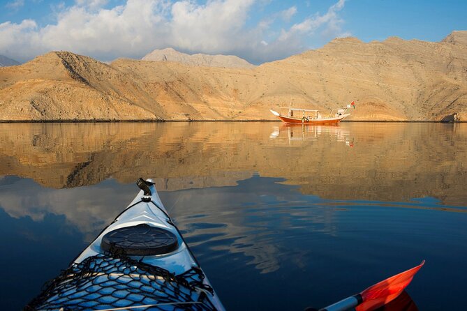 Khasab Full Day Dhow Cruise With Enjoying Snorkeling, Lunch & Dolphin Watching - Watching humpback dolphins from the dhow