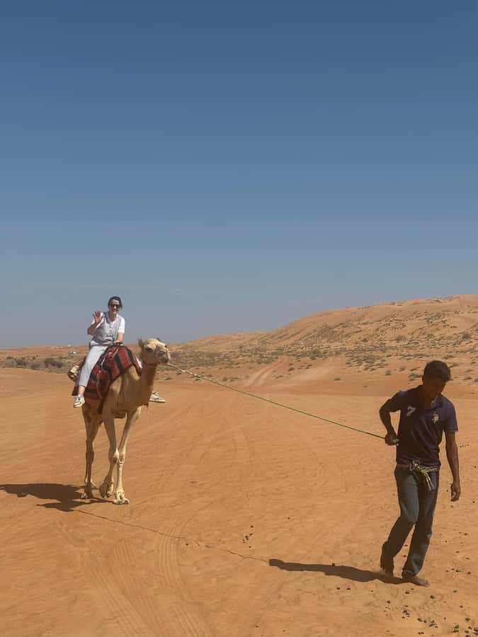 Muscat: Bidiya Desert Sunset Camel Ride with Transfer - Seeing the sunset from the dunes