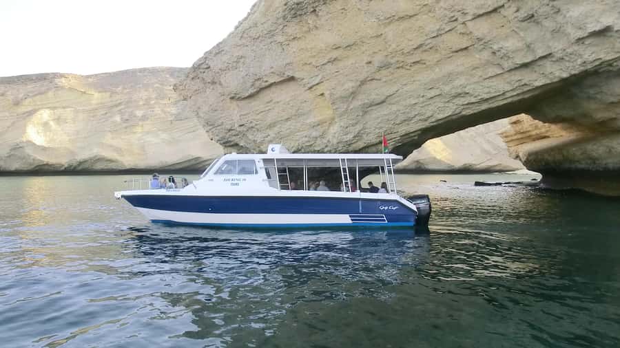 Muscat: Dolphin Watch & Snorkel Excursion - Coastal Views, Limestone Arches, and the Ride Back