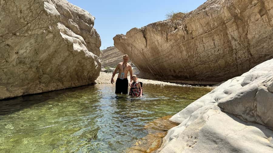 Muscat: Wahiba Desert and Wadi Bani Khalid Guided Group Tour - Wadi Bani Khalid: pools, palms, and canyon paths