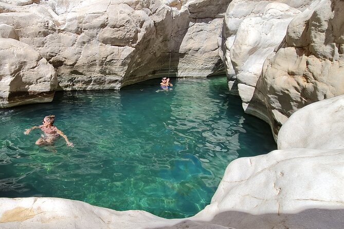 Oman Highlights: Wahiba Sands Desert & Wadi Bani Khalid Tour - Timing, sunset, and the return to Muscat