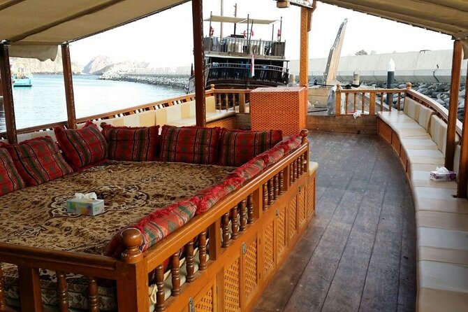 Omani Traditional Dhow Cruise: Sunset and Muscat Coastal View - Al Jalali Fort across the harbor