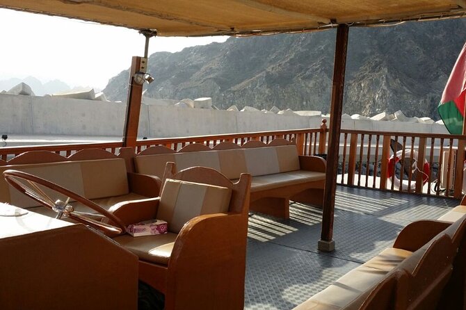 Omani Traditional Dhow Cruise: Sunset and Muscat Coastal View - Coffee, dates, and what is served onboard