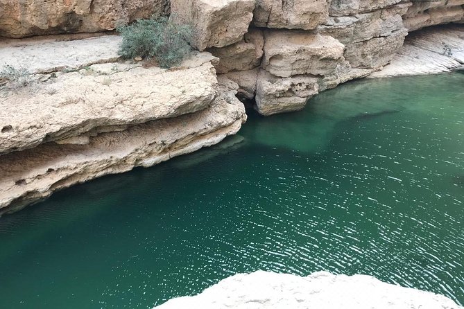 Private Day Trip to Wadi Shab & Bimmah Sinkhole Price Up To 5 Persons - Swimming through Wadi Shab’s clear pools