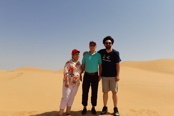 Sharing Tour to Wahiba Sand Desert and Wadi Bani Khalid Full Day - Coffee, dates, camels, and desert customs