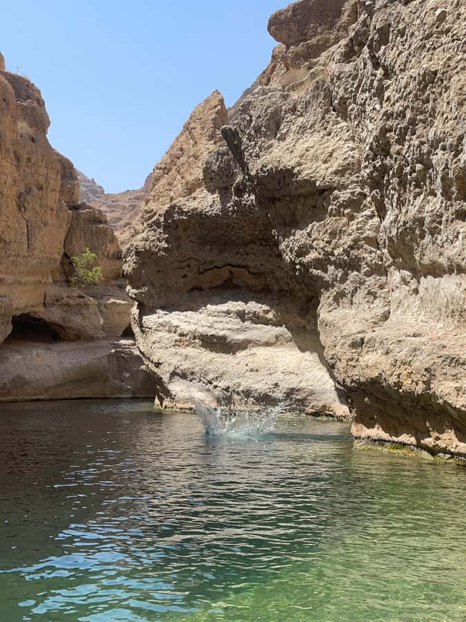Wadi Shab Parking Meet the Local Guide for Self drivers - Swimming to the cave waterfall